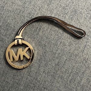 Michael Kors charm, MK logo for tote or purse.
